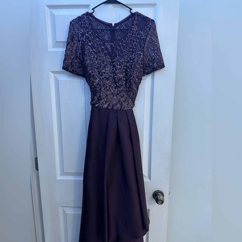 This dress is very beautiful and the fabric is very soft with a lot of details